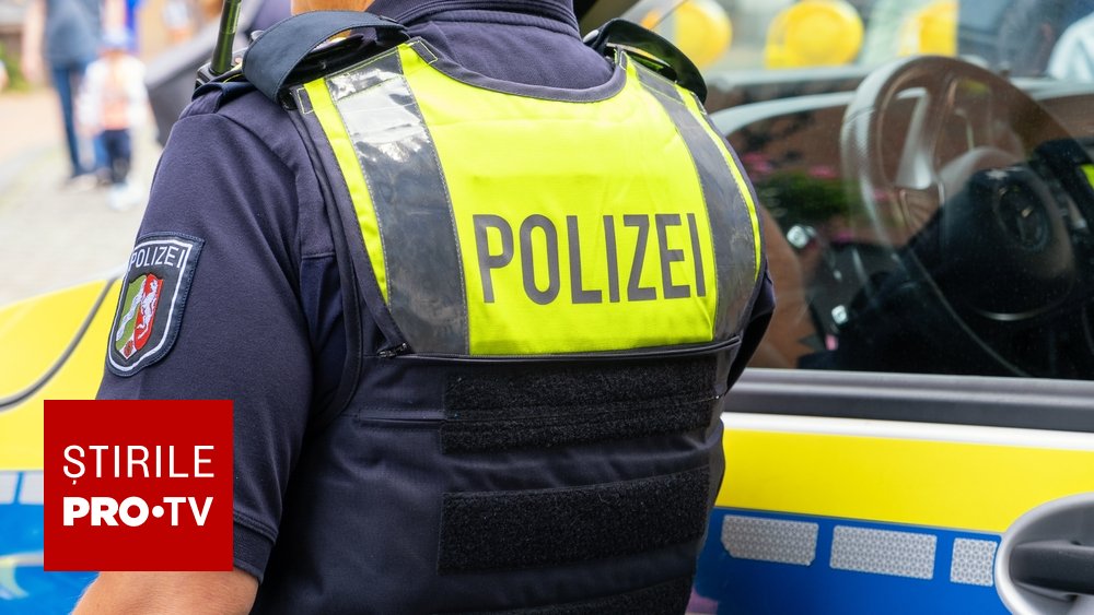 Poliția în fața unei clădiri în Stade, Germania, după atacul armat
