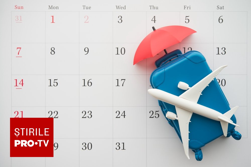 Angajat cu calendar și pix, planificând concediul de odihnă