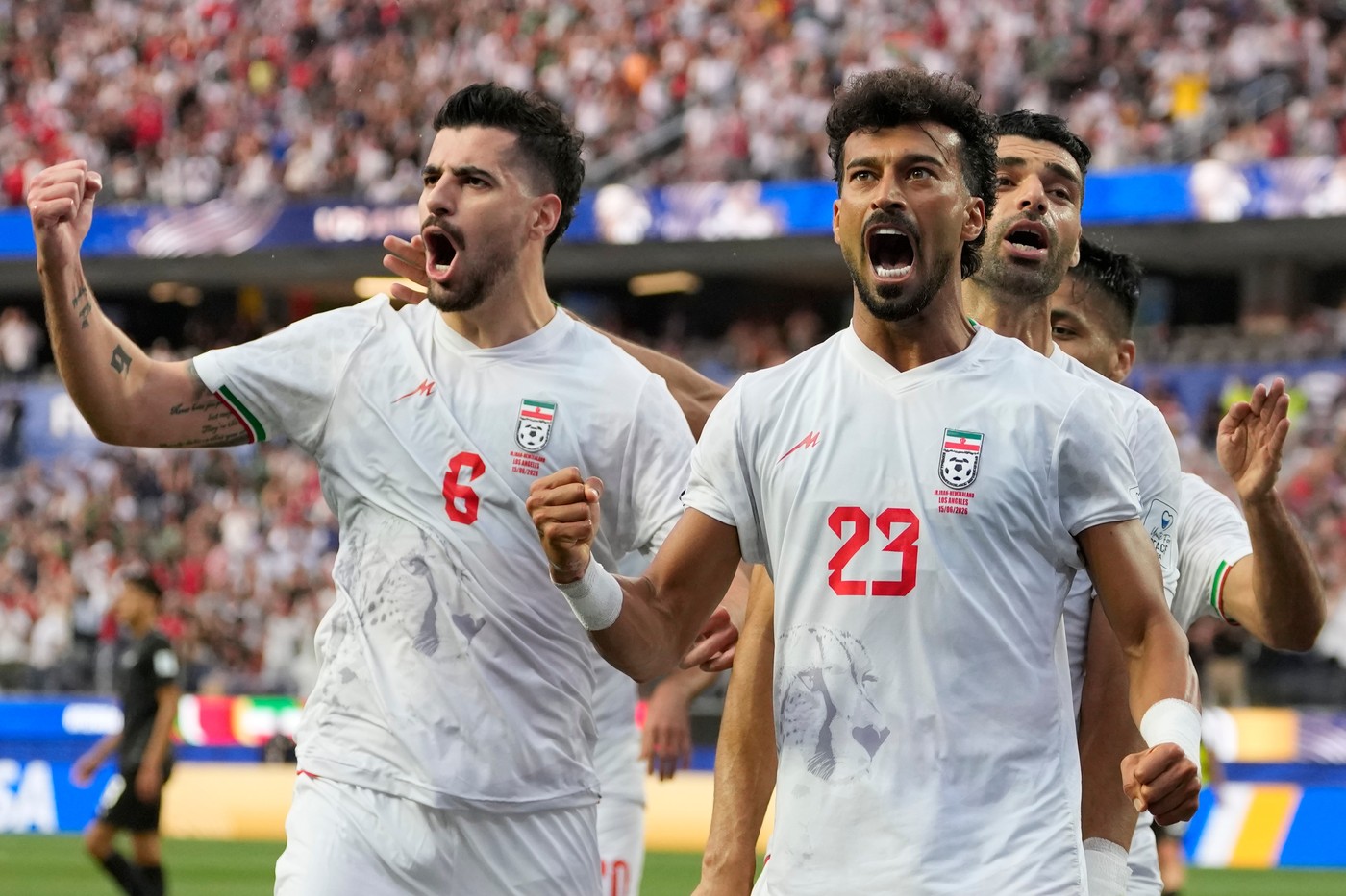 Jucători ai Iranului și Noii Zeelande în timpul meciului din grupa G a CM 2026