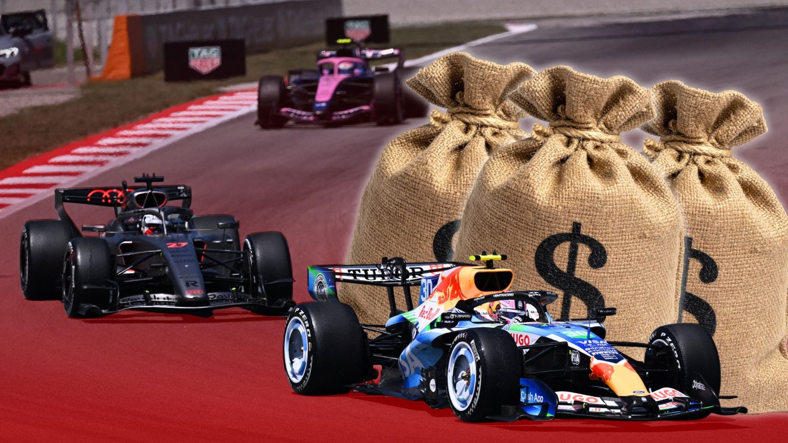 Mașini de Formula 1 pe pistă în timpul unei curse