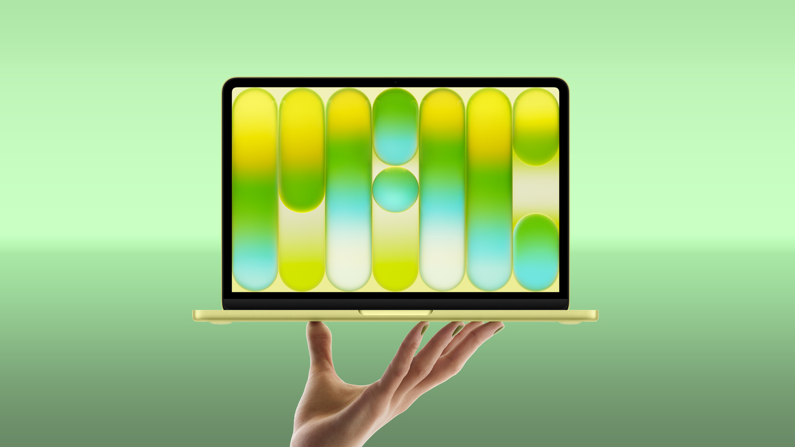 MacBook Neo pe o masă, alături de un raport IDC