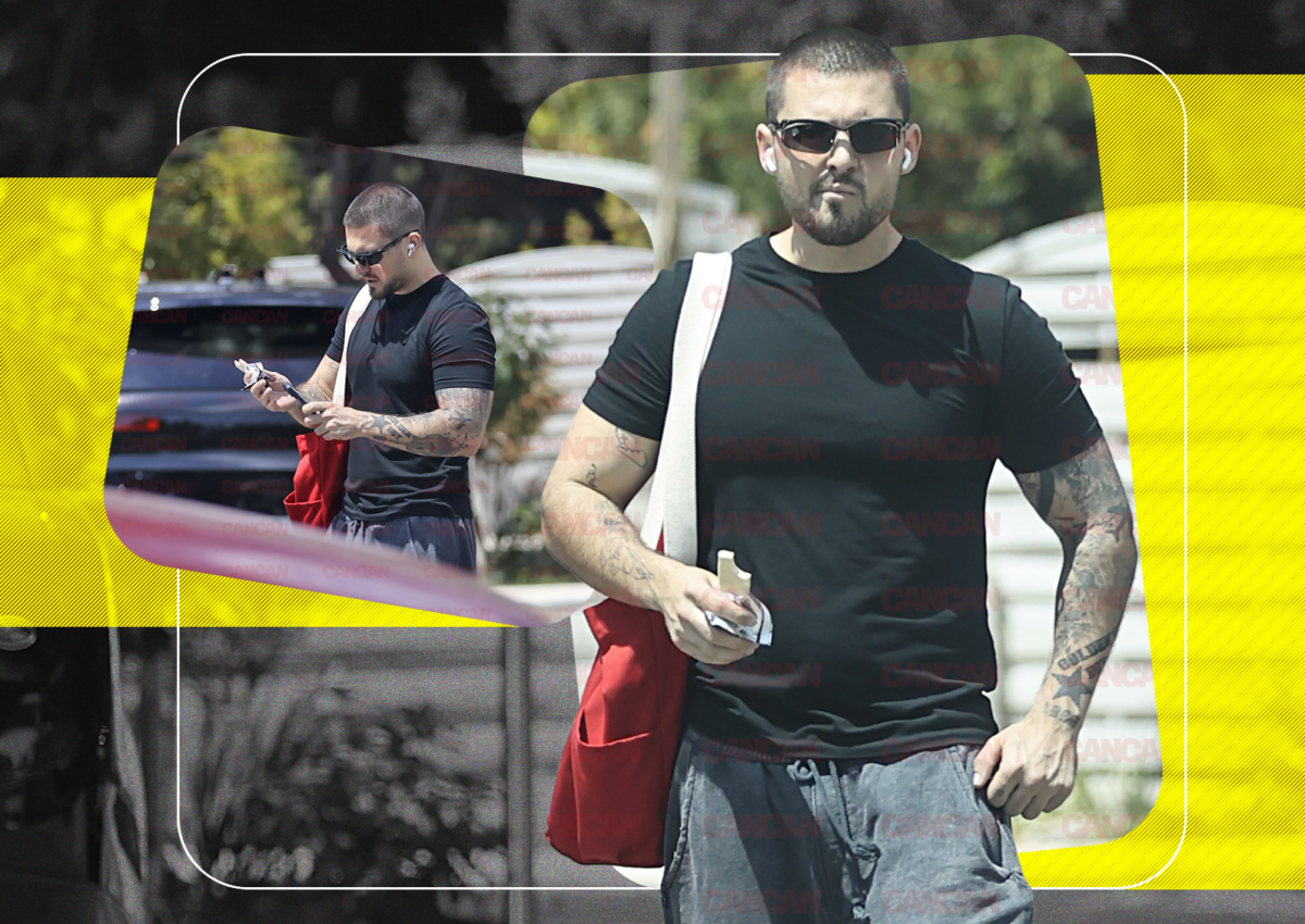 Mario Fresh ieșind de la sală, purtând ochelari de soare și tricou negru, cu bicepși vizibili