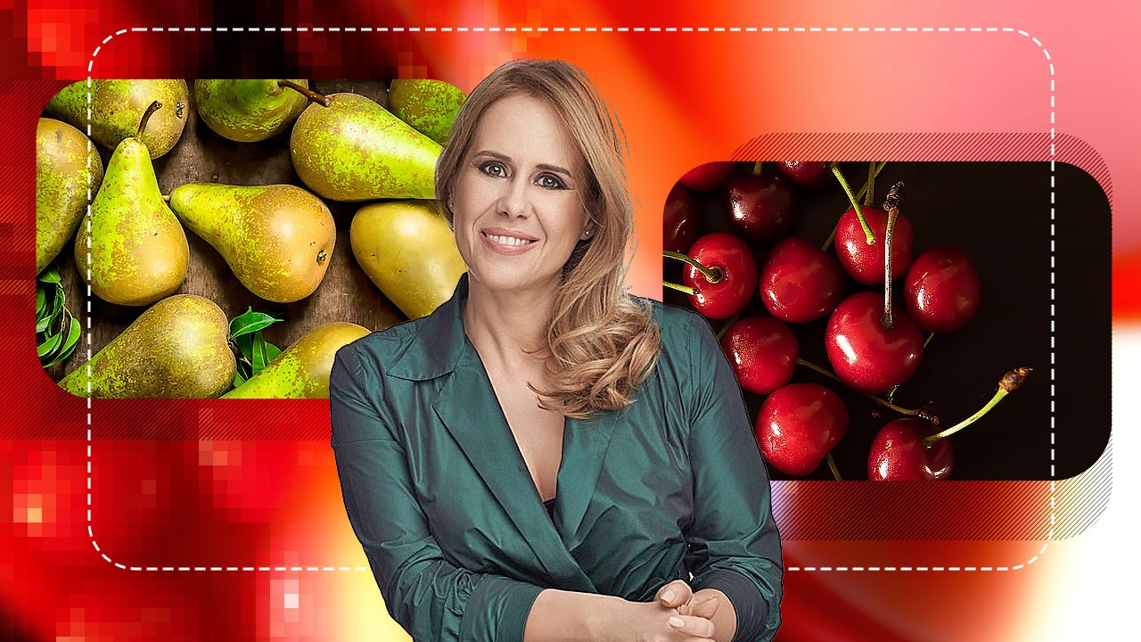 Mihaela Bilic ținând o pară în mână