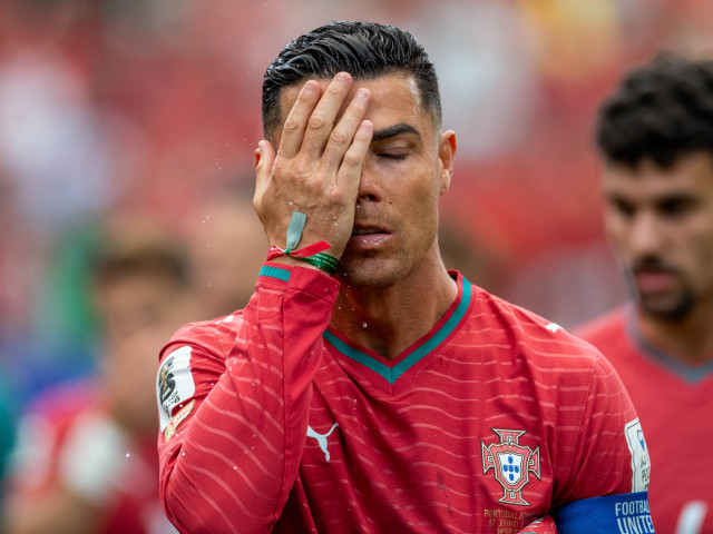 Jucători ai Portugaliei în meciul cu Columbia