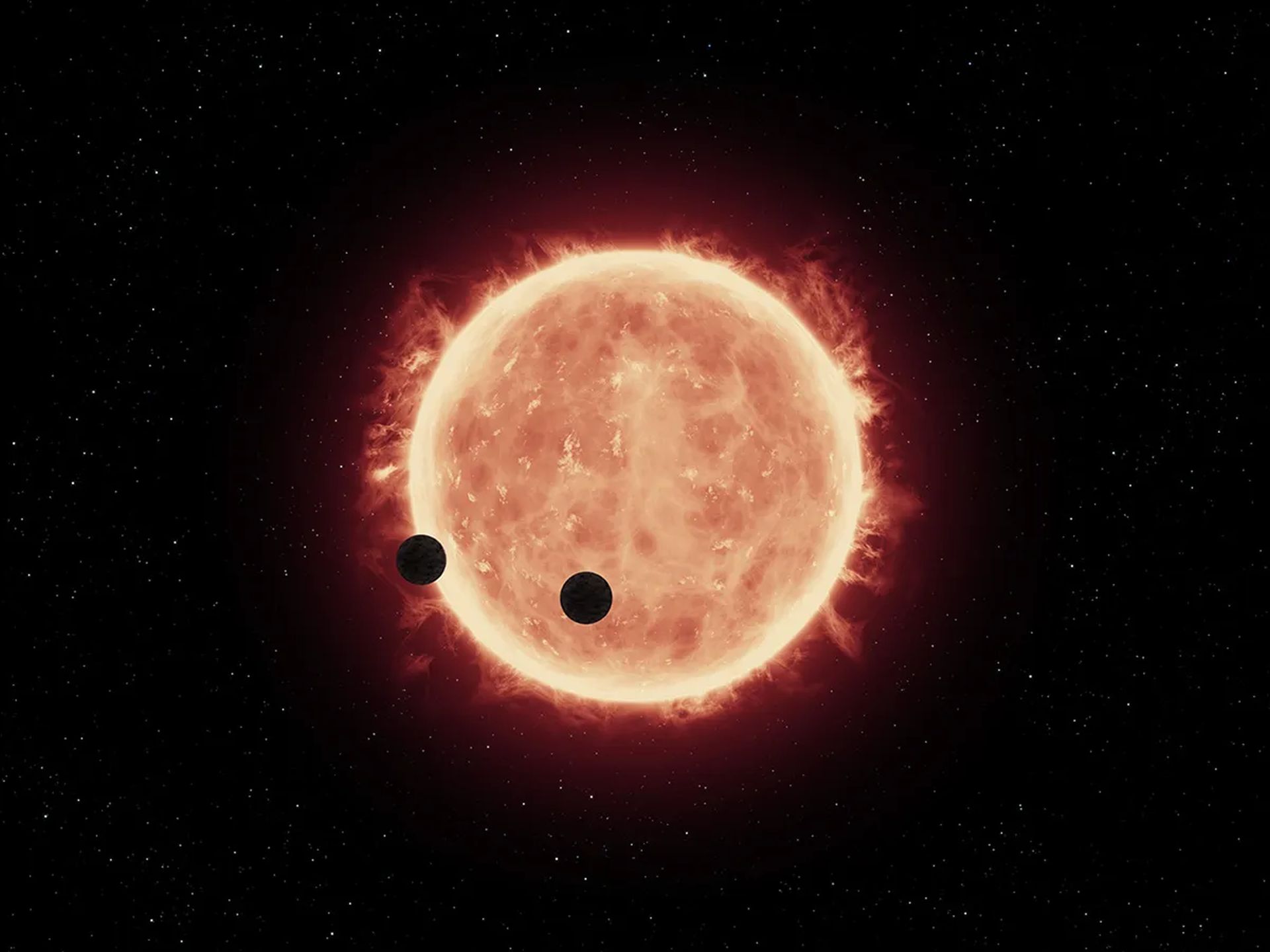 Ilustrație artistică a unei pitice roșii înconjurată de fragmente de planete